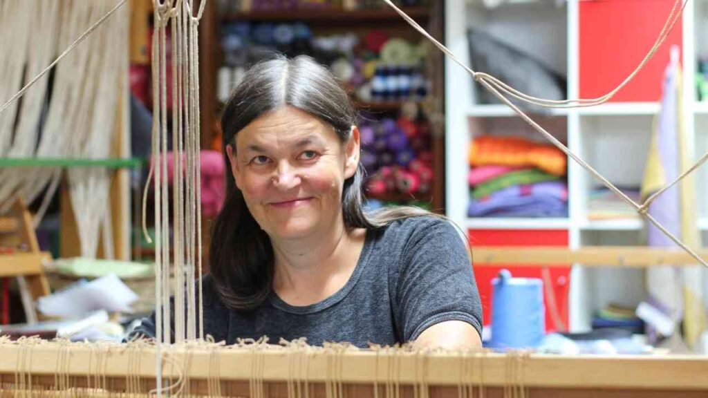 Dagmar Rehse beim Vortrag zur globalen Textilindustrie