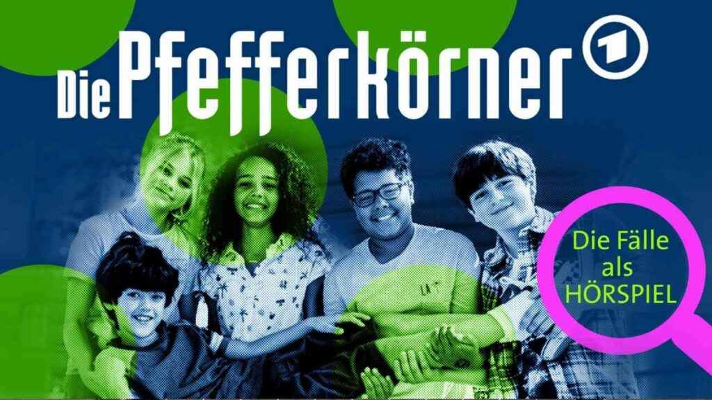 Gruppe von fünf Kindern, die zusammen posieren, mit dem Titel 'Die Pfefferkörner' im Hintergrund.