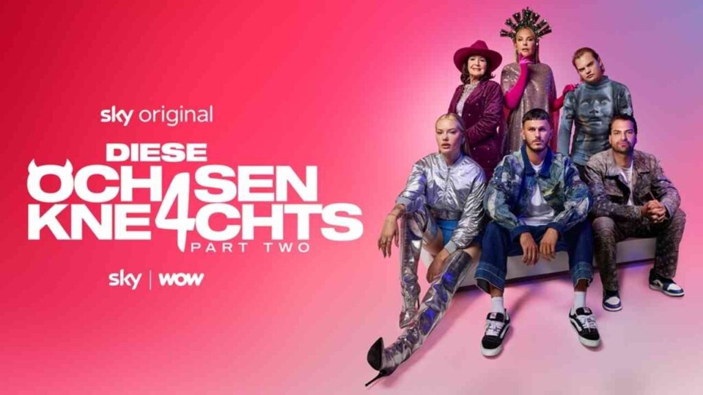 Gruppe von sechs Personen in modischer Kleidung vor einem pinken Hintergrund, mit dem Titel 'Diese Ochsenknechts - Teil Zwei'.