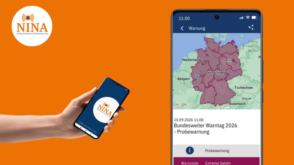 Smartphone mit der Warn-App NINA zeigt die Probewarnung zum Bundesweiten Warntag 2026