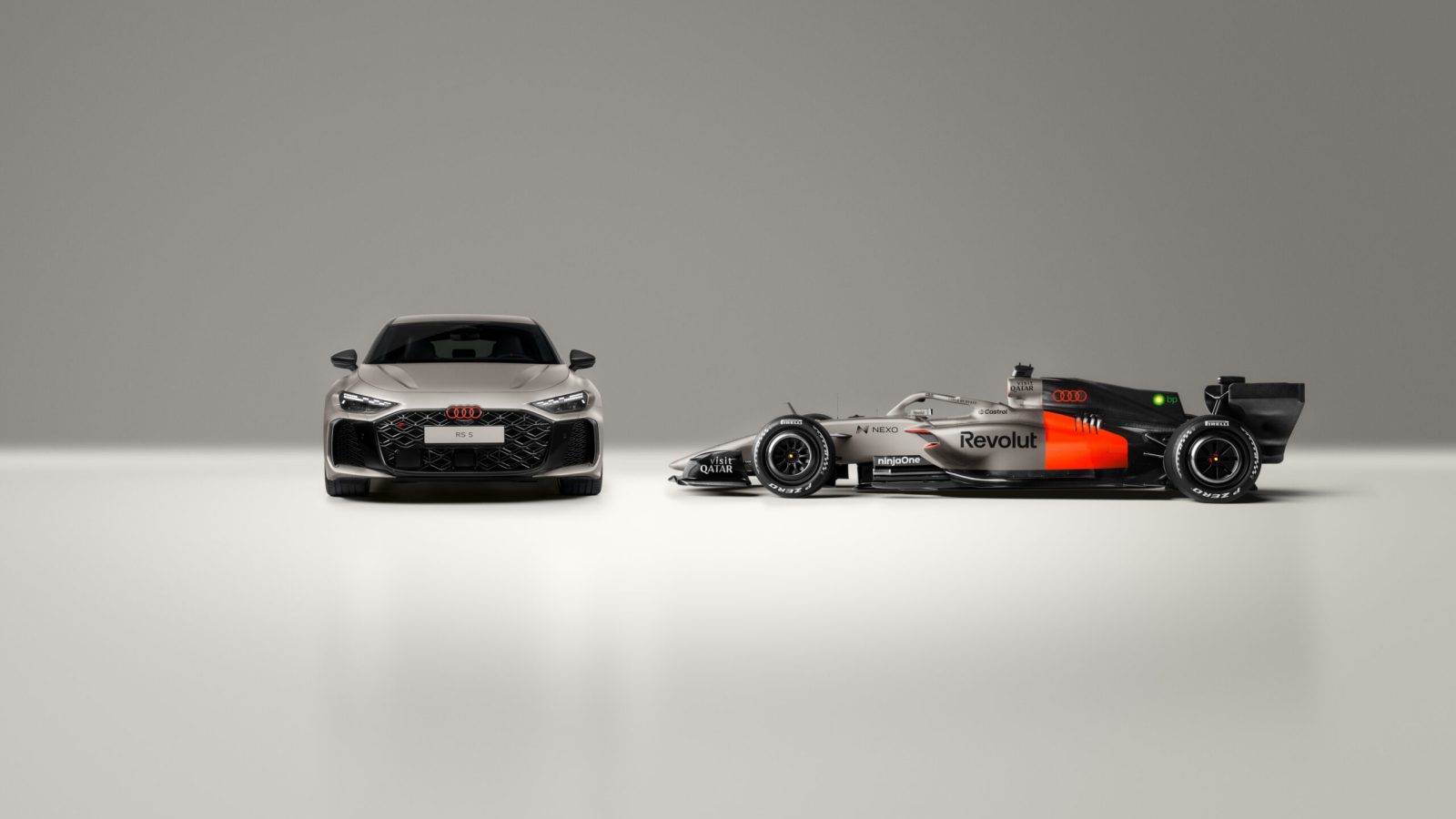 The Audi RS 5 next to the Audi R26. The RS 5 makes its debut at the Formula 1 Miami Grand Prix as a car for the F1® Pirelli Hot Laps