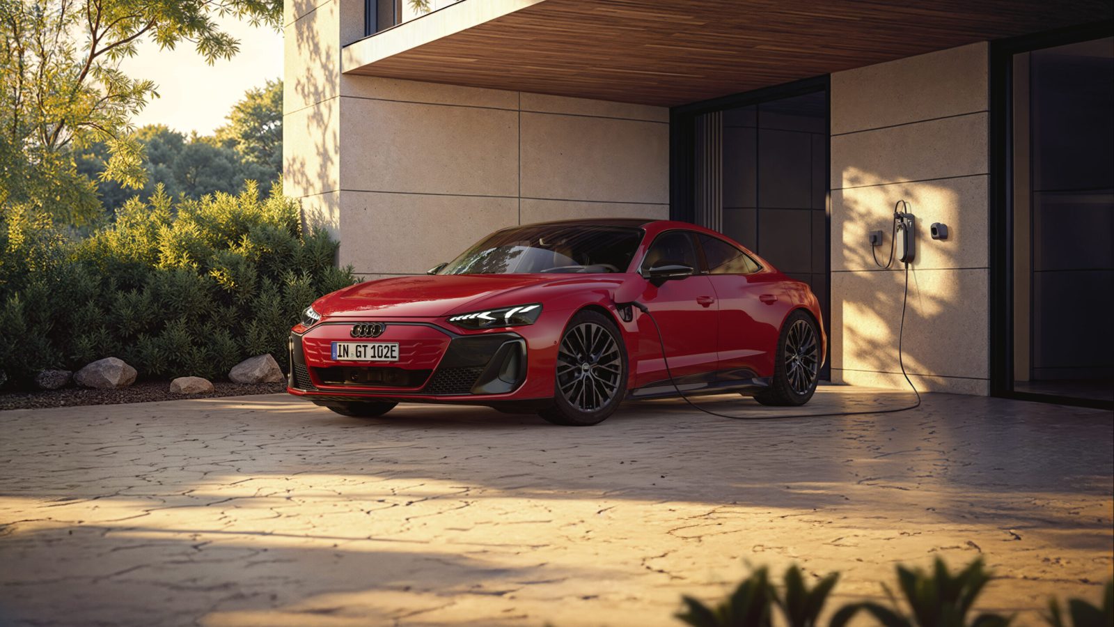 The Audi e-tron GT quattro combines dynamic driving with a high degree of everyday practicality. The background shown is AI-generated.