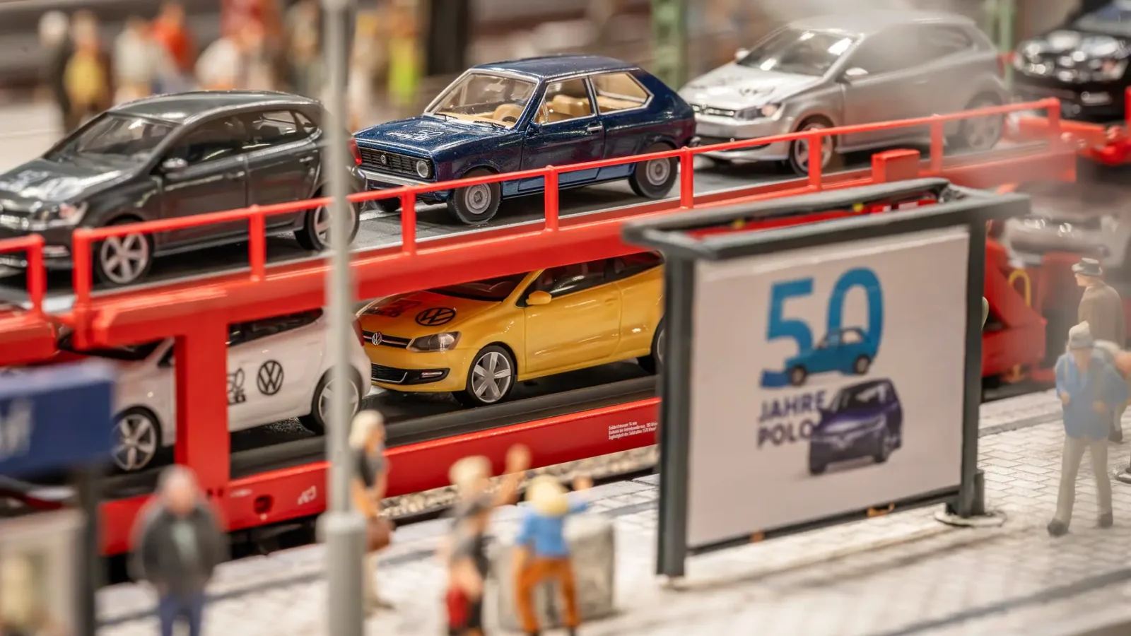 The Volkswagen Polo in the
‘Miniatur Wunderland’ in Hamburg's
Speicherstadt. The car train with anniversary branding is on the road in the miniature area of the "City of Hamburg".
